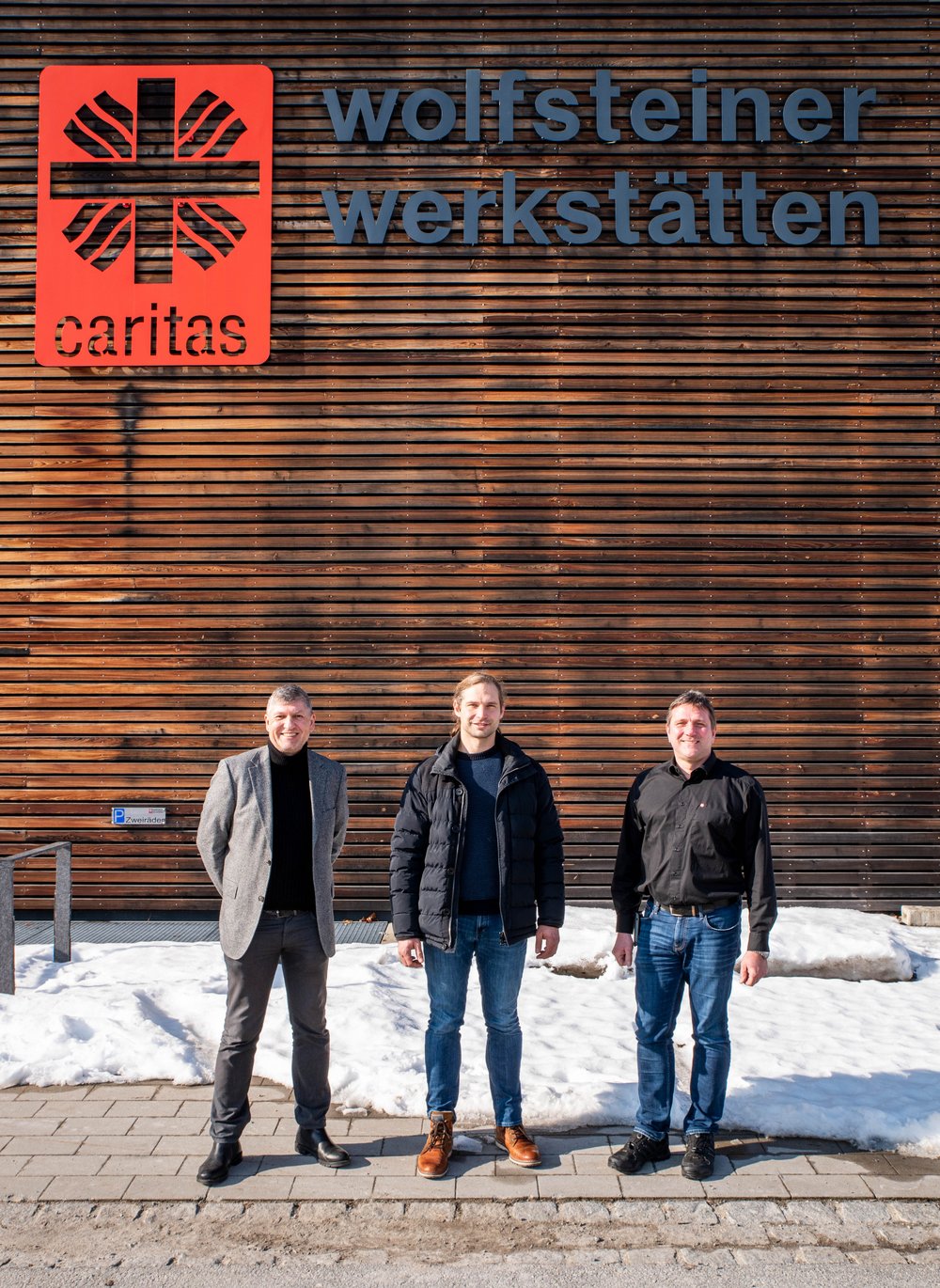 Schuberl bei den Wolfsteiner Werkstätten mit Einrichtungsleiter Helmut Weber und Produktionsleiter Andreas Manthey